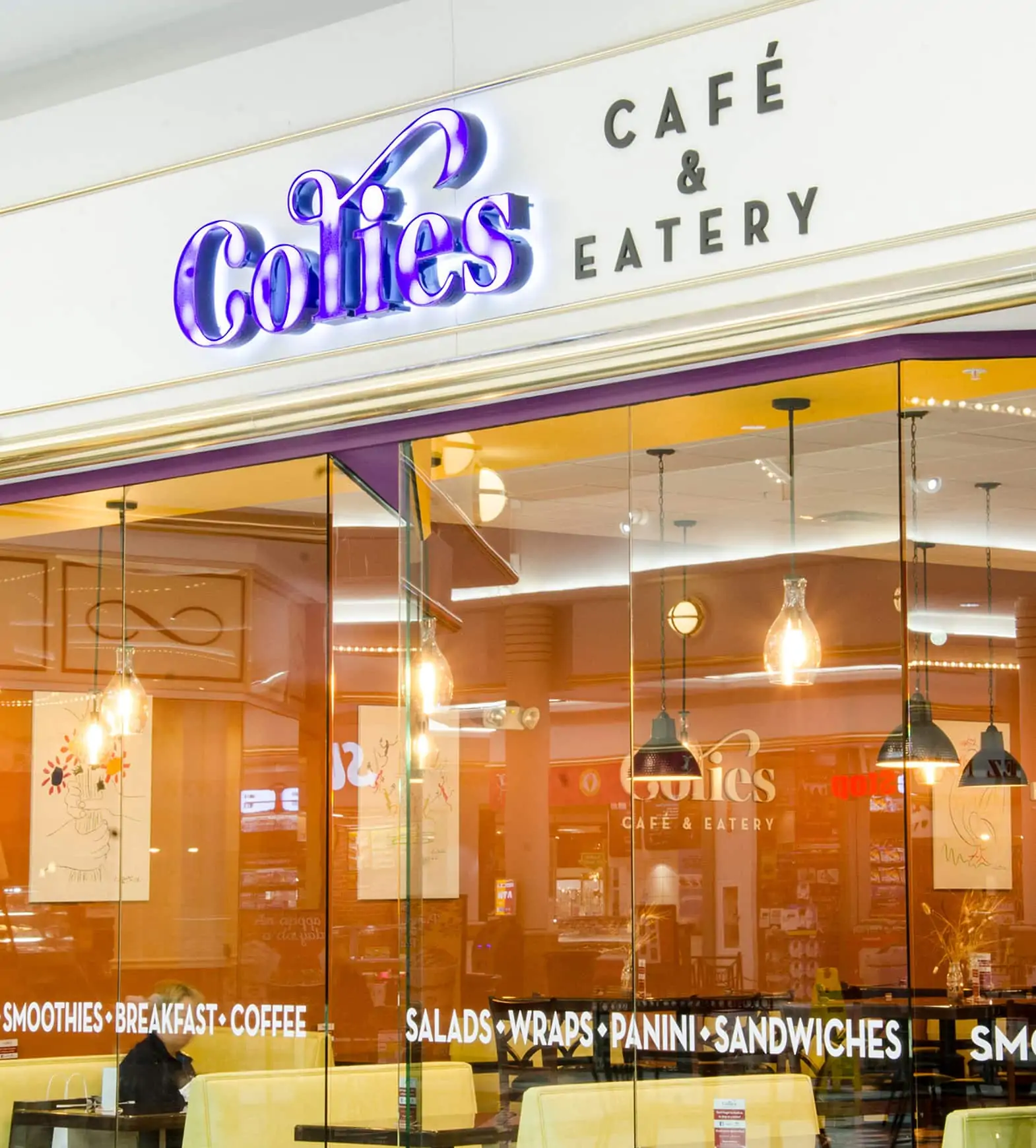 a store front for colie's cafe logo