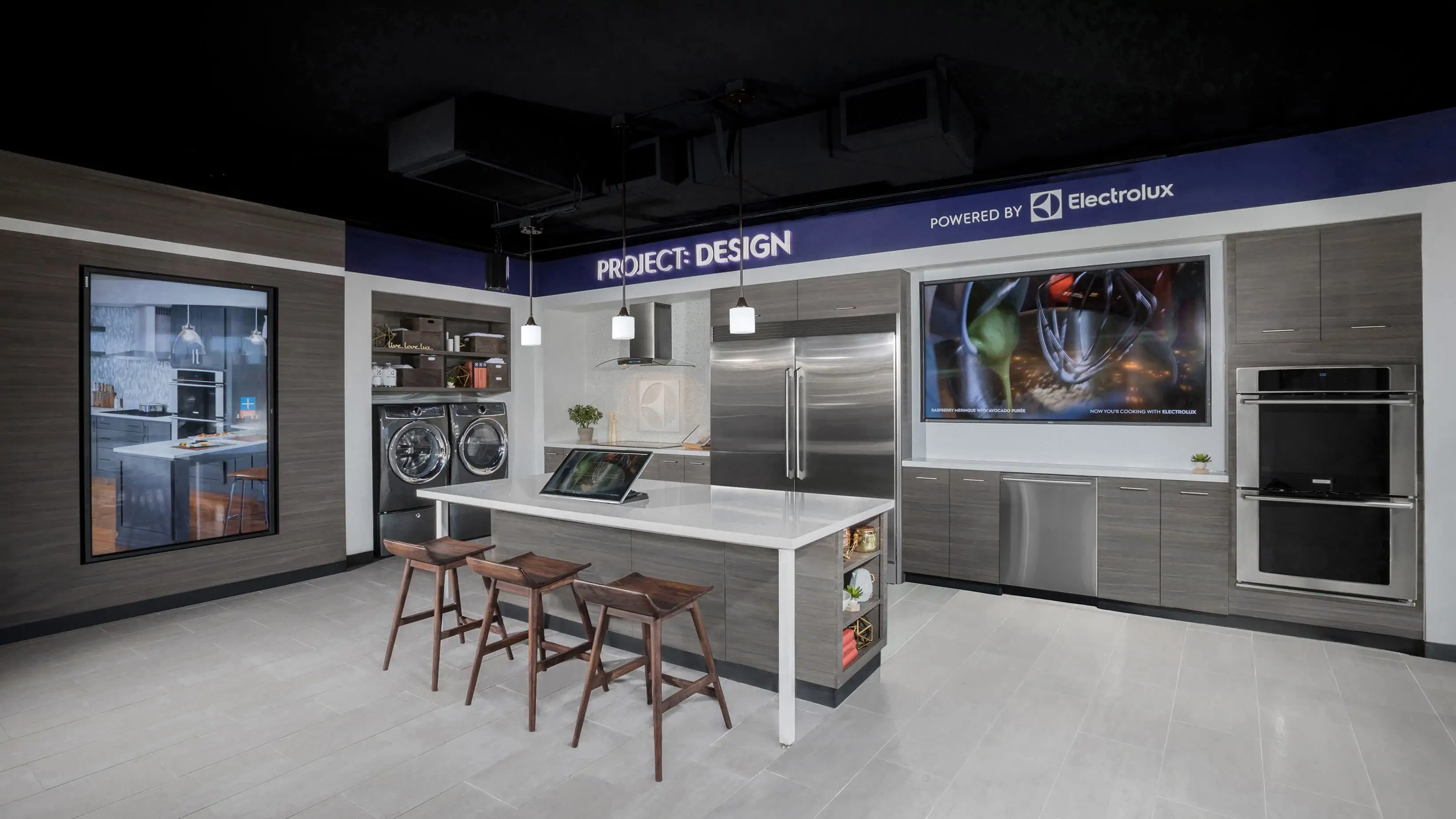 a photograph of the Electrolux showroom that has built in touchscreens