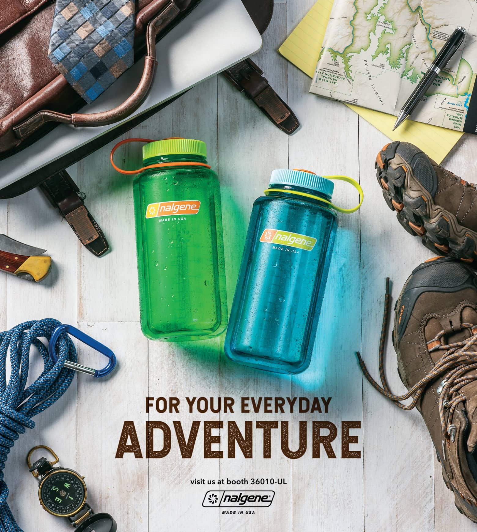 Nalgene water bottles surrounded by hiking gear