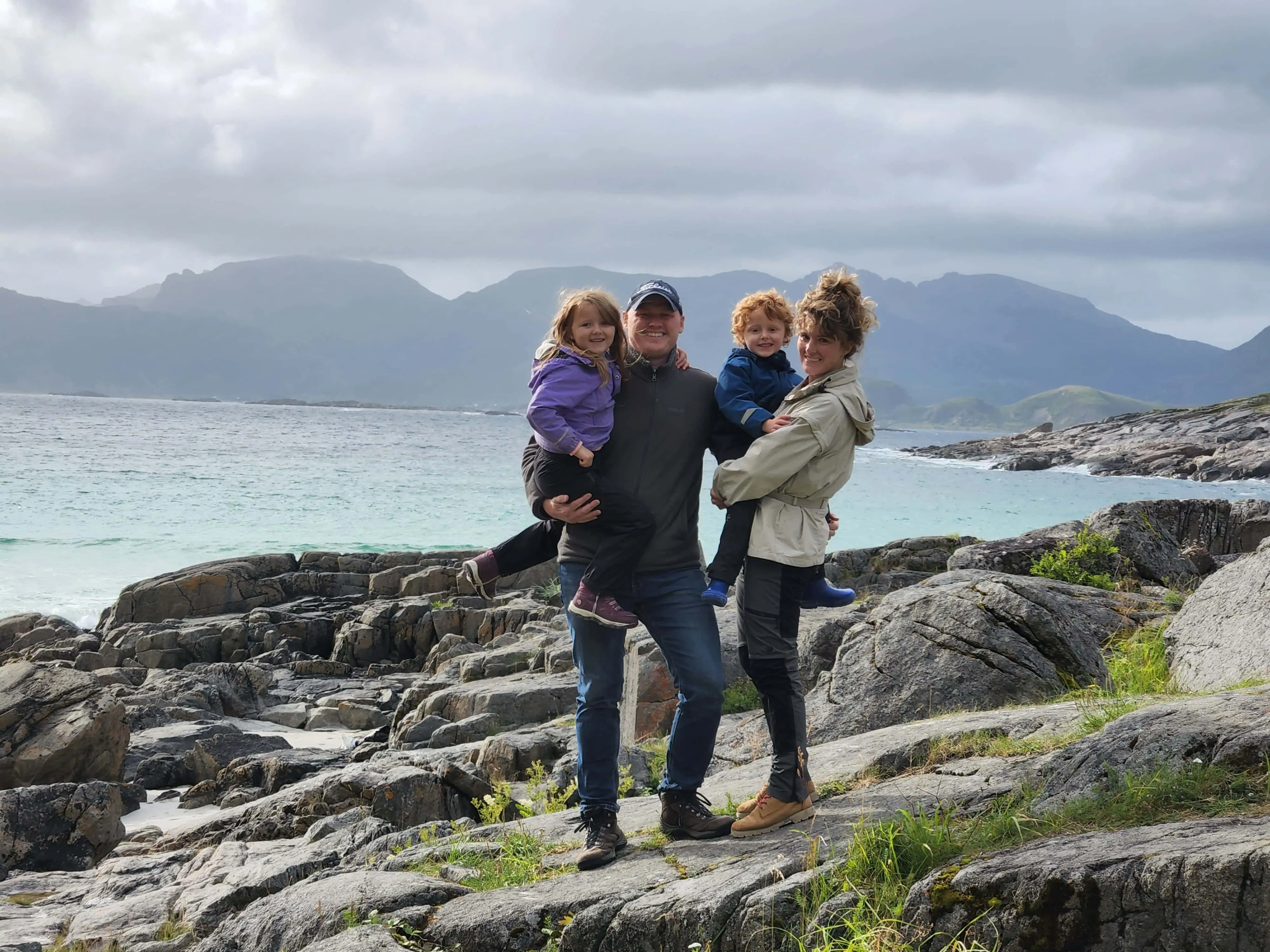 Makeway Co-Founder Josh, with his family on a rocky coast in Norway.